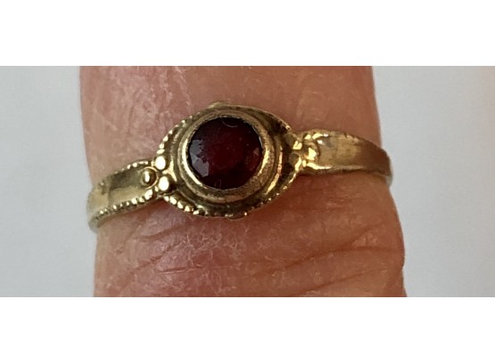 10 K Gold Baby Ring With Red Stone