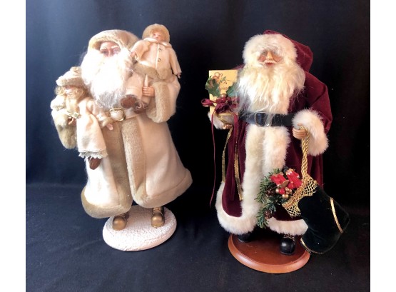 Two Large Resin And Velour Santas