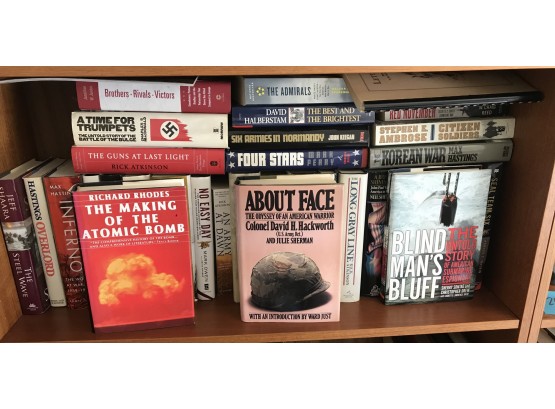 Shelf Filled To Overflowing Of Books About Wars