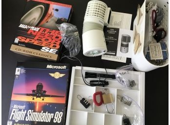 Assorted Items Including Sharper Image Fan, Computer Games, Assorted Locks.