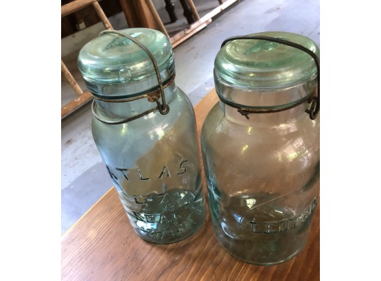 Two Boxes Filled With Old Canning Jars And Other Bottles