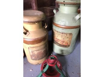 Two Painted Milk Cans And A Christmas Tree Stand