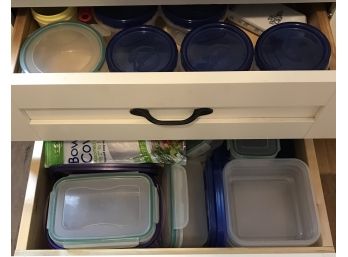 Assorted Plastic Containers/measuring Cups Found In Two Drawers In Kitchen