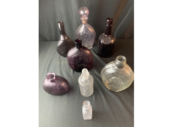 Four Clear Glass/four Purple Glass Bottles
