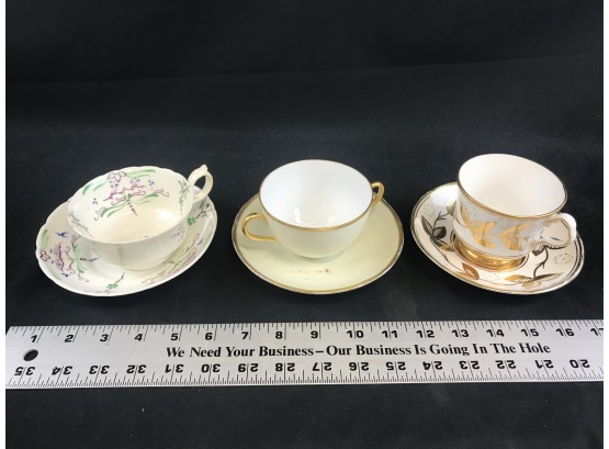 Three Tea Cups With Saucers