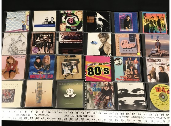 24 Music CDs From The 1980s With Metal CD Rack