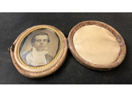 Daguerreotype Of Man In Oval Cloth Covered Case