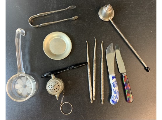 Assorted Items Found In Silverware Box