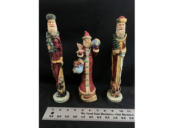3 Tall Skinny Standing Santa Clauses