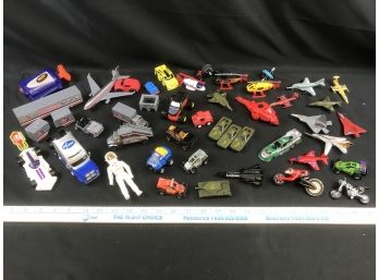 Assortment Of Cars Trucks,  Airplanes And Helicopters With Blue Basket