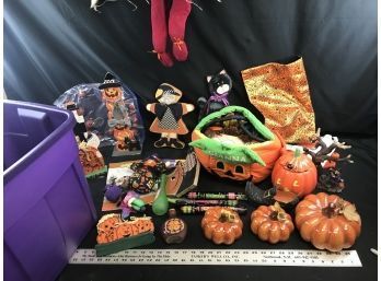 Purple Tote With Lid Filled With Thanksgiving And Halloween Decorations