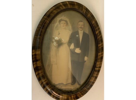 Oval Framed Antique Tinted Photo