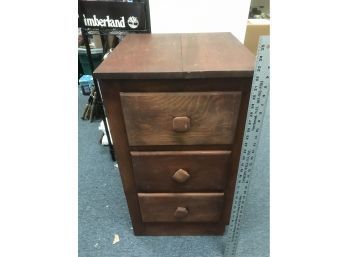 Three Drawer Stained Wood Cabinet 18 Inches Wide By 19 Inches Long By 33 Inches High