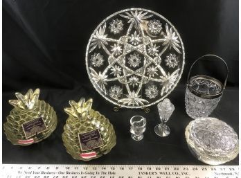 Various Glass Pieces With Red Plastic Bin