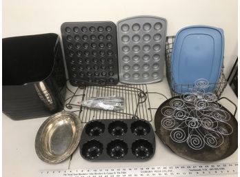 Lot Of Cupcake Baking Trays And Other Kitchen Items In Black Plastic Bin