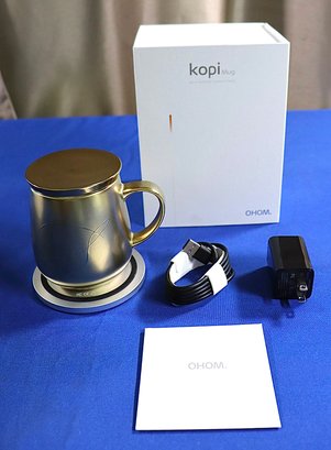 Lot 236- NEW Kopi Mug Self-heating Ceramic Mug Charging Cell Phone Pad RETAILS $100