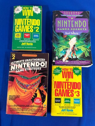 Lot 397 - Collection Of 4 Nintendo Softcover Guide Books - Game Strategies - How To Win - Secrets
