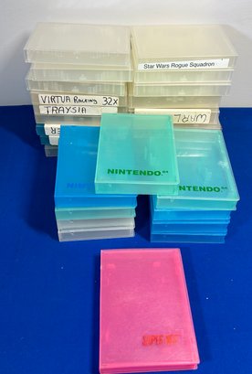 Lot 82- Lot Of 27 Clam Shell Plastic Video Game Cases - N64, SNES, Disc & Cartridge - Nintendo