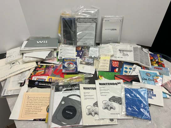 Lot 208- Mixed Video Game Paper Lot - Inserts, Directions, Manuals, Posters Etc