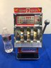 Lot 414 - Casino 7 Mini Slot Machine WACO - Great Graphics! Novelty 25 Cent Fun