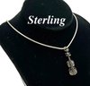 Lot 458- Sterling Silver Chain With Musical Cello Violin Pendant
