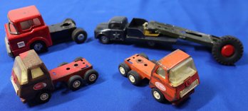 Lot 153- 1950-60s Vintage 5 Piece Tin Medal Toy Lot - Tonga Tractor Trailer Cabs - Flatbed - Trucks