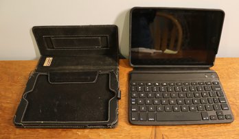 Lot 295-  IPad  Mini Model A1455 With Zagg Keyboard & Snugg.com Case - Circa Late 2012