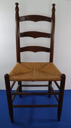 Lot 106- Antique Ladder Back Dining Room Chair With Rush Seat