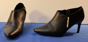 Lot 506A - Calvin Klein Leanna Black Leather Low Heeled Bootie - Size 8