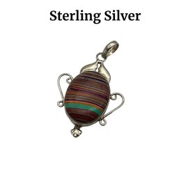 Lot 41- Sterling Silver Rainbow Calsilica Pendant