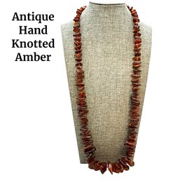 Lot 69- Antique Hand Knotted Amber Necklace 29 Inches