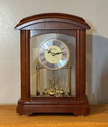 Lot 271- Bulova Quartz Mantle Clock - Cherry Wooden Case - Model B1848 - Working