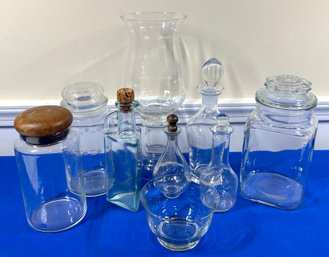 Lot 411 - Clear Glass Lot Of Vases - Jars - Cruets - Bowl