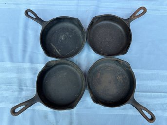 Lot 315 - Cast Iron Lot Of 4 Small Wagnerware Sidney No. 0 Fry Egg Pans - Farmhouse Primitive Cookware 1053Q