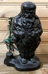 Lot 55- Dept 56 Cast Iron Santa Claus With Metal Tree - Christmas Decor - Door Stop