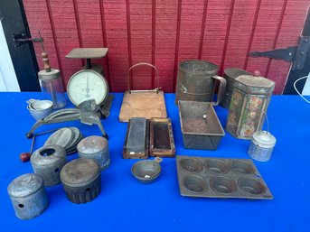 Lot 435- Primitive Kitchen Lot - Knife Sharpener In Box - Sifter- Scale- Pans - Tins - Slicer