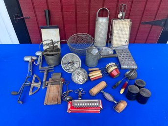 Lot 457- Kitchen Vintage Lot - Shredders, Measuring Cups, Slicers, Mixers