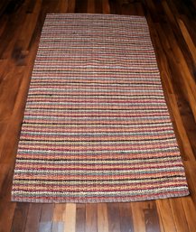 Lot 520 - Crate And Barrel Malaga Handwoven Rag Rug In Fiesta 5x8 100 Cotton