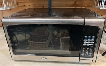 Lot 93- Oster Microwave - Works Great! - Kitchen Appliance