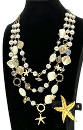 Lot 350 - Beachy Triple Strand Necklace - Crystals - Faux Pearls - Starfish - Seahorses - Shells - Starfish