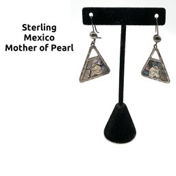 Lot 45- Sterling And Mother Of Pearl Resting Mexican Man Earrings