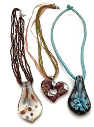 Lot 91- Glass Pendants On Necklaces (3 Pieces)