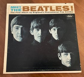 Lot 69- Meet The Beatles Capital Records Vinyl Record - Made In USA