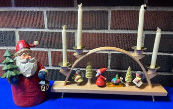 Lot 77- Erzgebirge German Wood Candle Holder Display And Carved Wooden Santa Claus