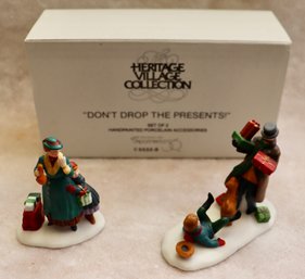 Lot 611CJV - Department Dept 56 - Heritage Village Collection Don't Drop The Presents Porcelain Original Box