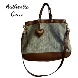 Lot 23- Authentic GUCCI Blue Denim Purse - Certificate Included With Leather Gucci Heart Keychain