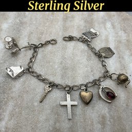 Lot 511- Sterling Silver 1950s Charm Bracelet