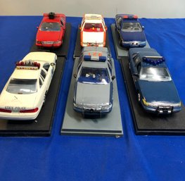 Lot 505 - Lot Of 6 Police Car Models ERTC In Clear Plastic Cases - Mass - State Trooper - Fire Department