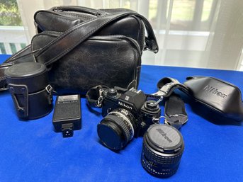 Lot 397- Nikon 35mm Camera M90 50 Mm - Flash SBE - Macro Lens 100mm - Heavy Duty Leather Camera Bag