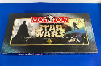 Lot 377 - Star Wars Monopoly New In Open Box - Classic Trilogy Collection - Parker Brothers